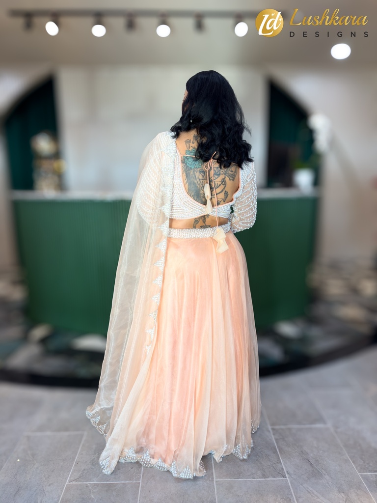 Lushkara Peach and Silver Embellished Lehenga