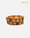 Lushkara Gold Bangle With X Shape Green and Red Stone