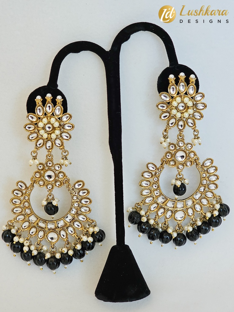 Lushkara Gold-Toned Kundan Jhumka Earrings with Black Bead Accents