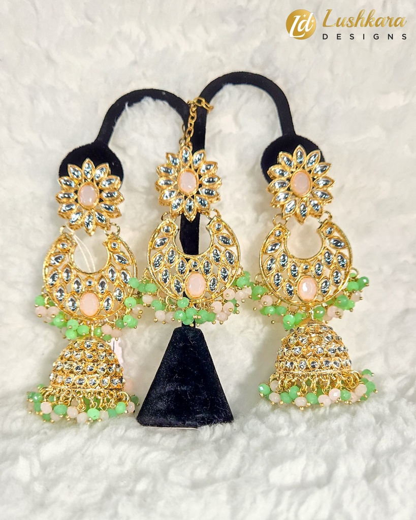 Lushkara Gold-Toned Kundan Jhumka Earrings with Pink and Green Bead Accents Maang Tikka Set