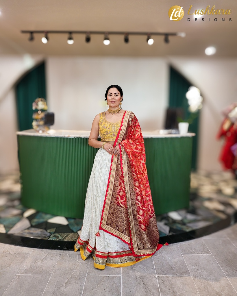 Lushkara Ivory Red, Yellow And White Traditional Lehenga