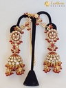 Lushkara Gold-Toned Kundan Jhumka Earrings with Red Bead Accents