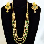 Lushkara Gold Kundan Green and White Necklace Set