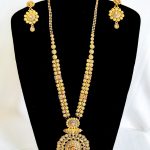 Lushkara Gold Pendant Necklace with White Stone