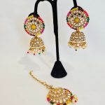 Lushkara Gold-Toned Jhumka Earrings with Multicolor Accents and Maang Tikka Set