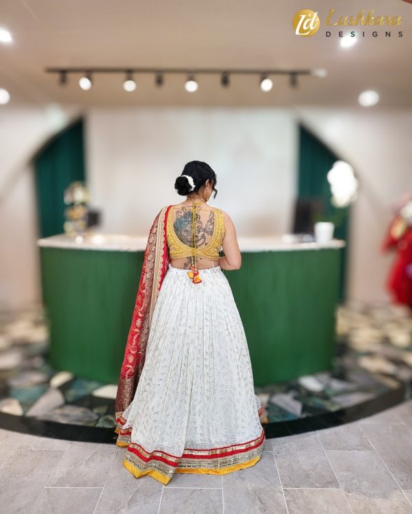 Lushkara Ivory Red, Yellow And White Traditional Lehenga - Image 3