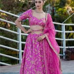 Lushkara Rani Pink Floral Raw Silk Lehenga with Broad Neck Blouse with Belt with Heavy Laces