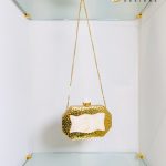 Lushkara Gold Pearl Bow Clutch