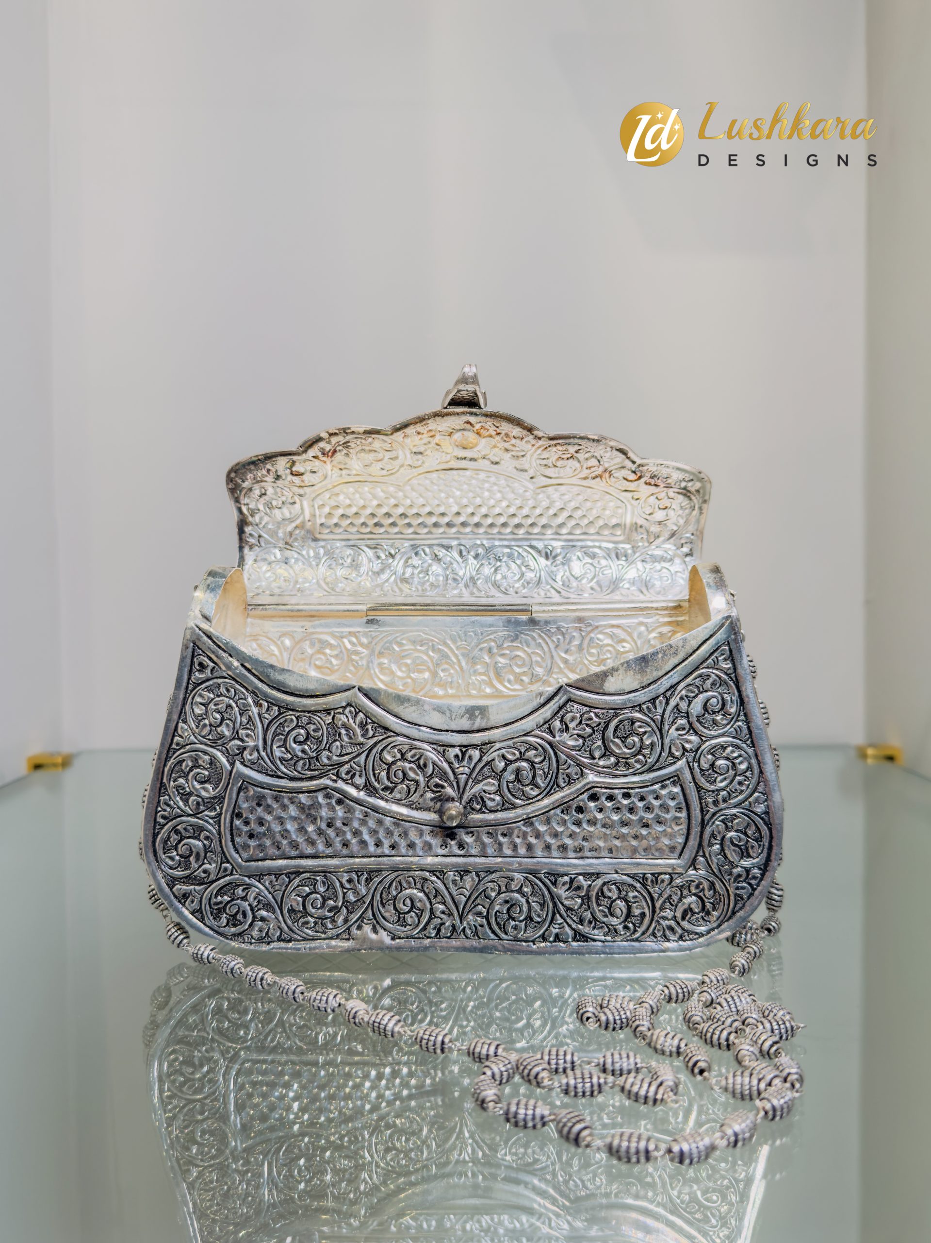 Lushkara Handcrafted Pure Silver Engraved Clutch