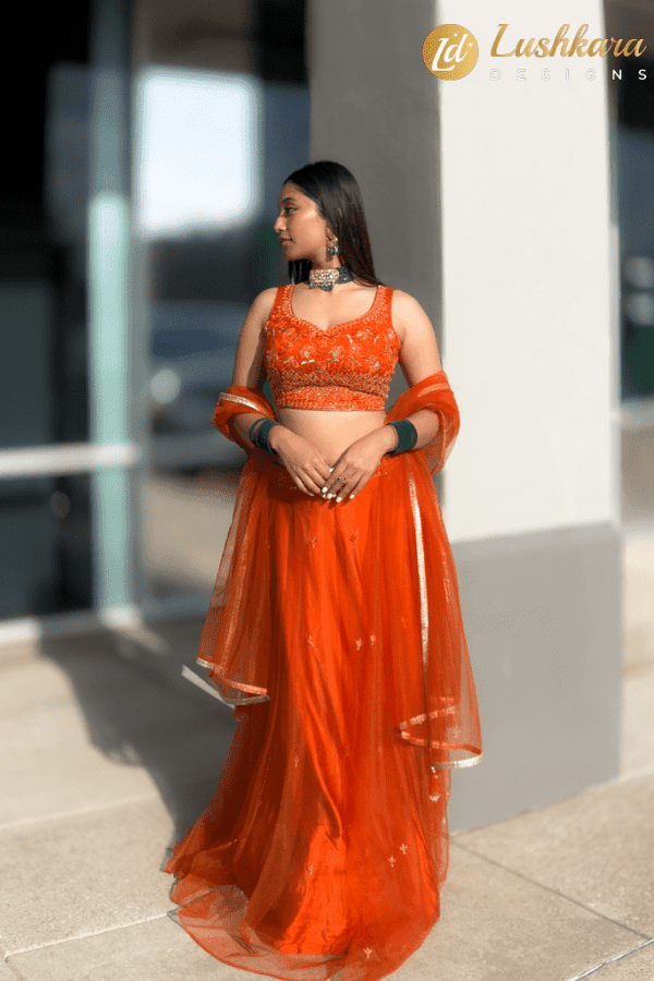 Lushkara Orange Embroidered Lehenga Set with Net Dupatta