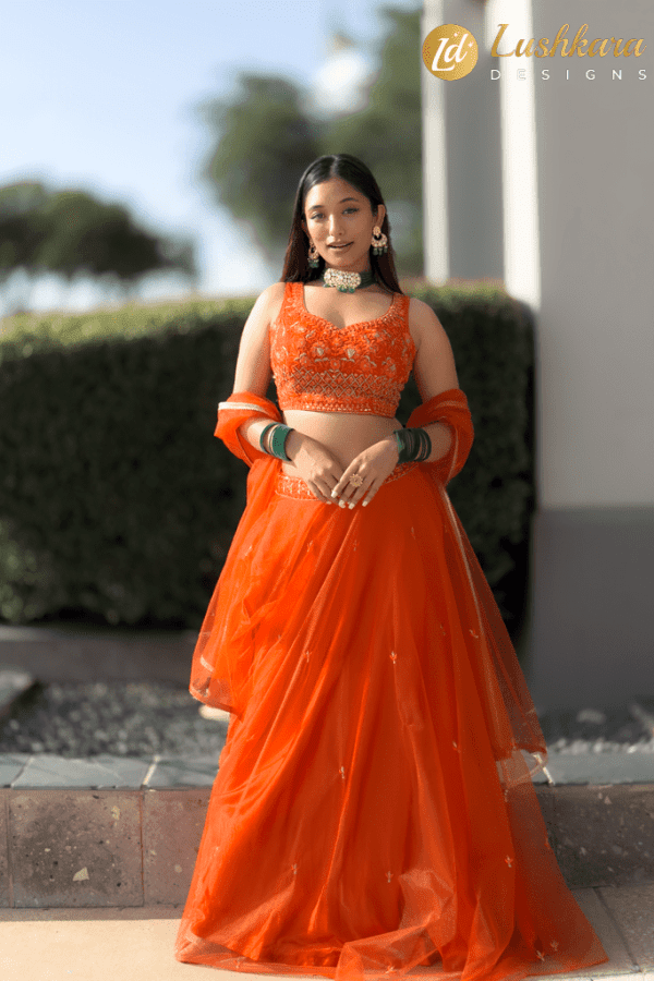 Lushkara Orange Embroidered Lehenga Set with Net Dupatta