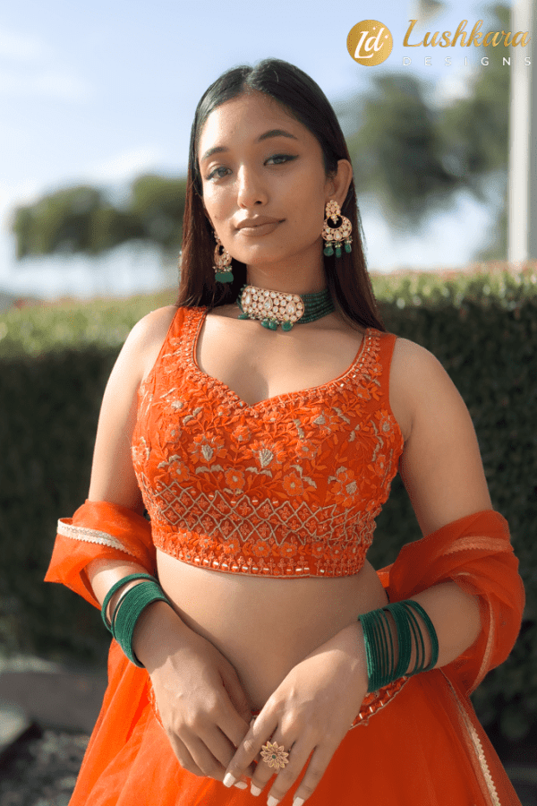 Lushkara Orange Embroidered Lehenga Set with Net Dupatta