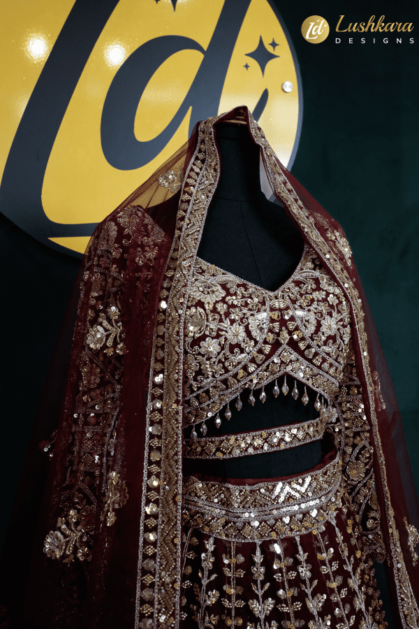 Lushkara Deep Red Bridal Lehenga with Heavy Zardozi and Mirror Work