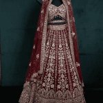Lushkara Deep Red Bridal Lehenga with Heavy Zardozi and Mirror Work