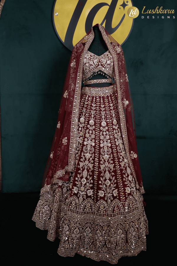 Lushkara Deep Red Bridal Lehenga with Heavy Zardozi and Mirror Work
