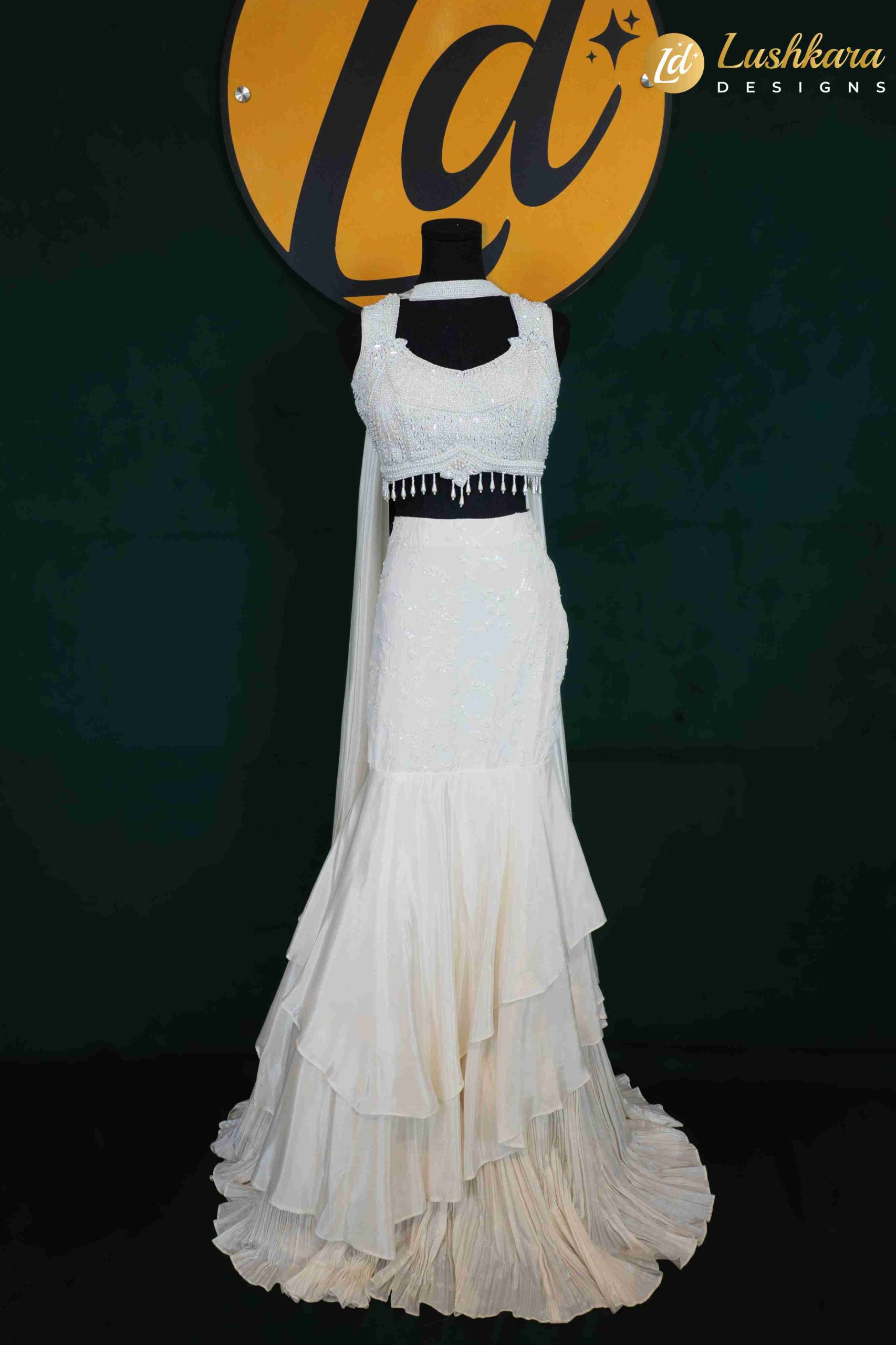 Lushkara White Tiered Lehenga Set – Pearl Embellished Blouse