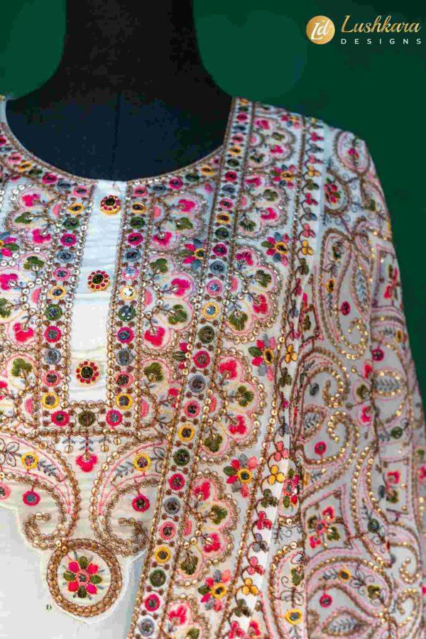 Lushkara Ivory Suit with Multicolor Embroidery and Dupatta