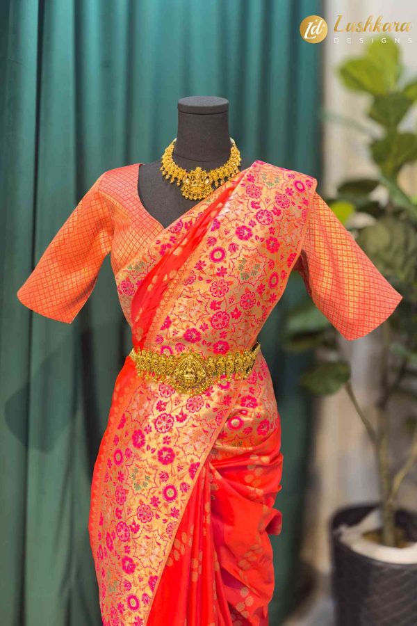 Lushkara Orange-Red Banarasi Saree with Golden Zari Floral Work