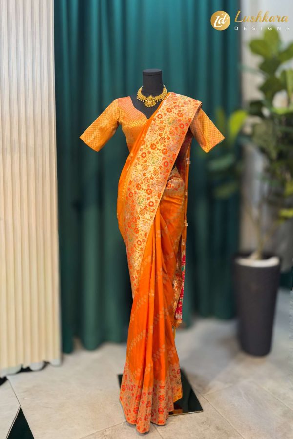 Lushkara Orange Banarasi Saree with Golden Zari & Floral