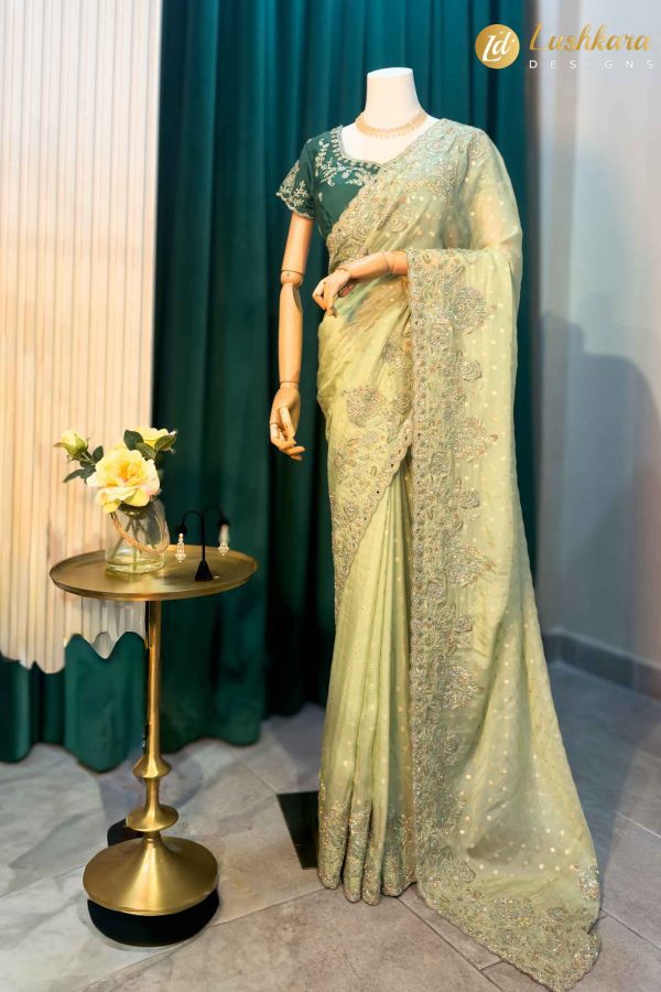 Lushkara Mint-Green Embroidered Net Saree with Contrast Blouse