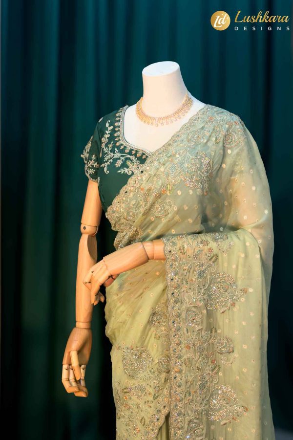 Lushkara Mint-Green Embroidered Net Saree with Contrast Blouse