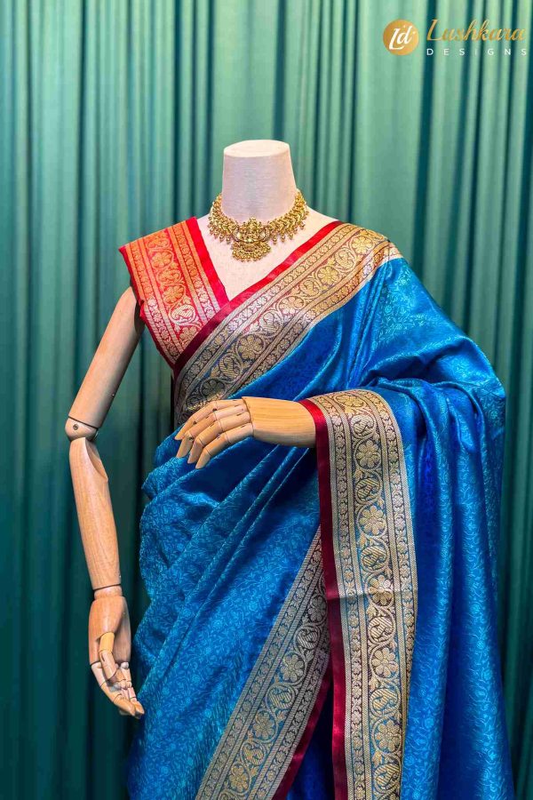 Lushkara Royal Blue Banarasi Silk Saree with Red Border