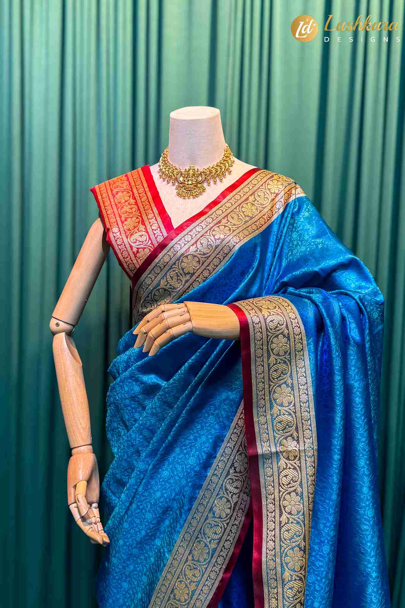 Lushkara Royal Blue Banarasi Silk Saree with Red Border