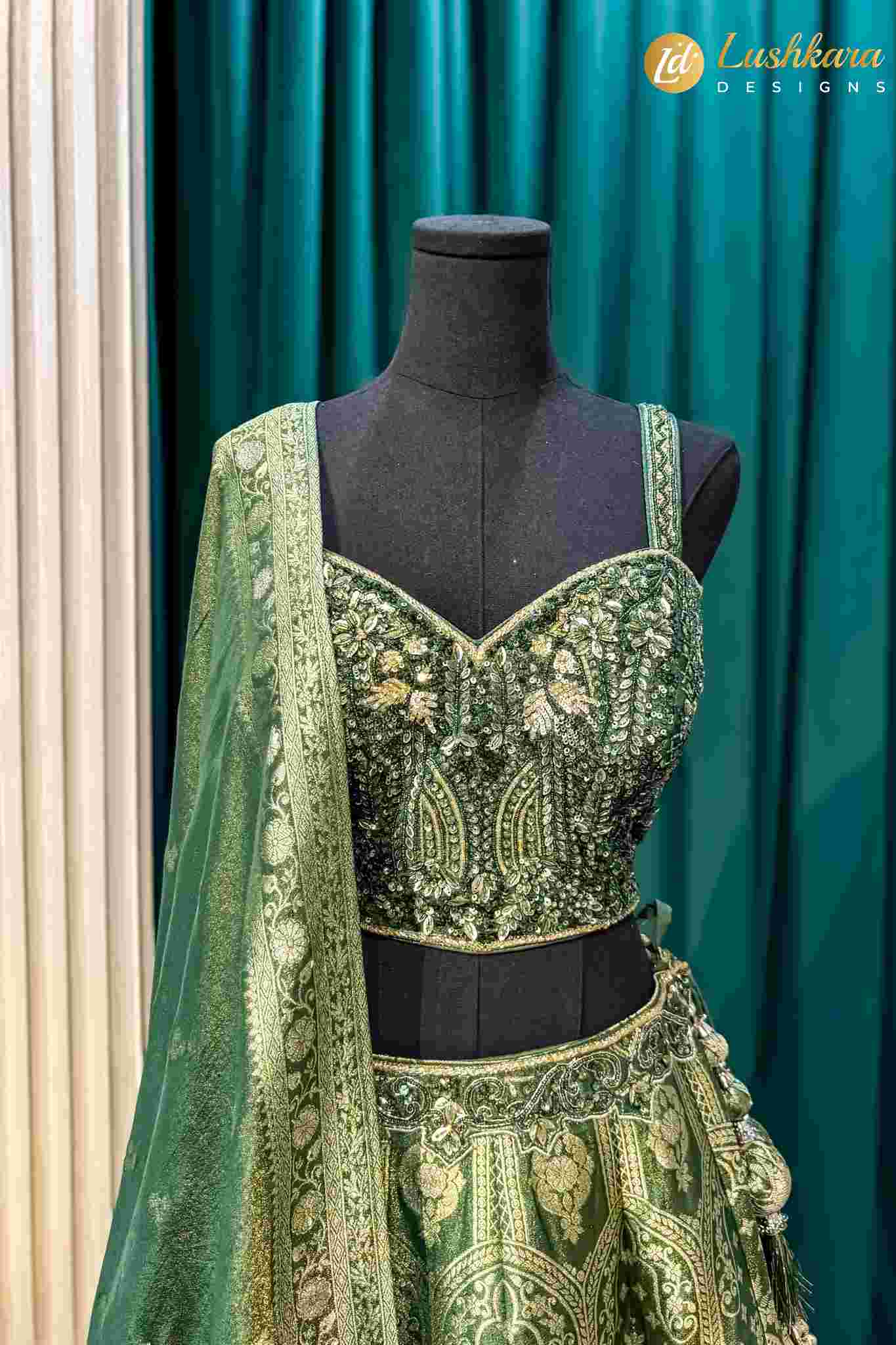 Lushkara Olive Green Embroidered Lehenga Set with Net Dupatta