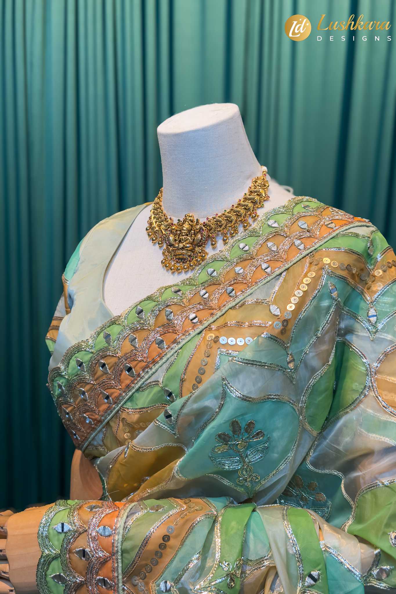 Lushkara Pastel Green Organza Saree with Mirror Work