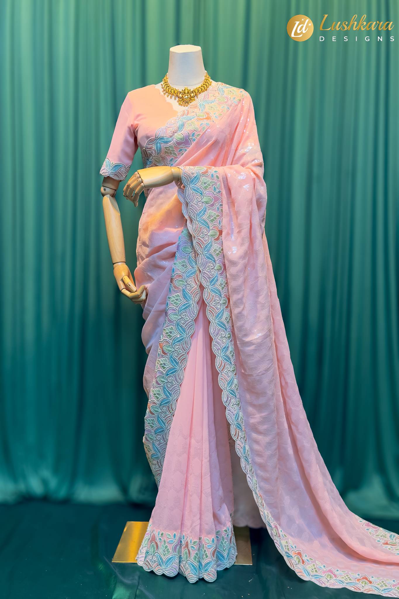 Lushkara Light Pink Embroidered Net Saree