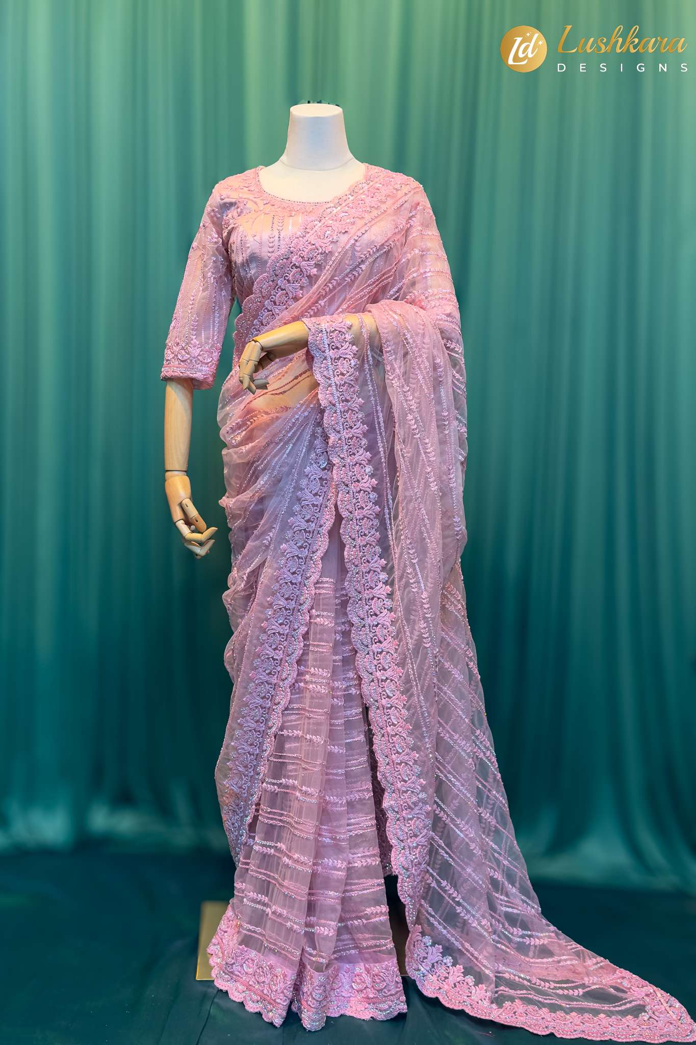 Lushkara Light Pink Embroidered Net Saree