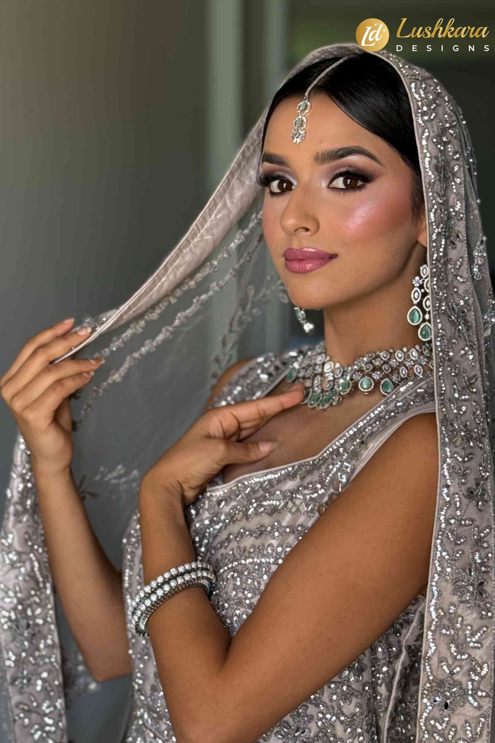 Lushkara Silver Heavy Embroidered Bridal Lehenga