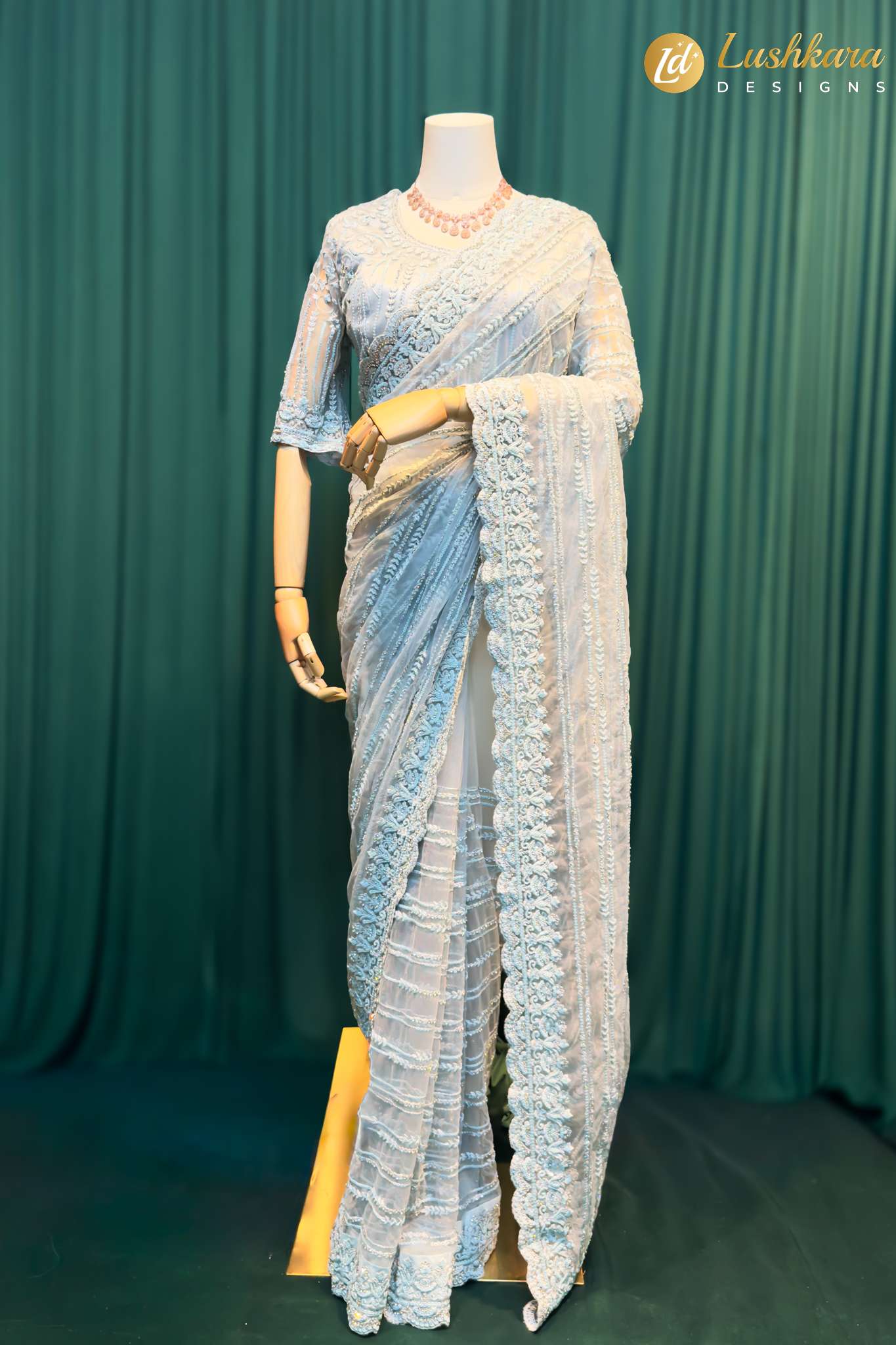 Lushkara Light Blue Embroidered Net Saree