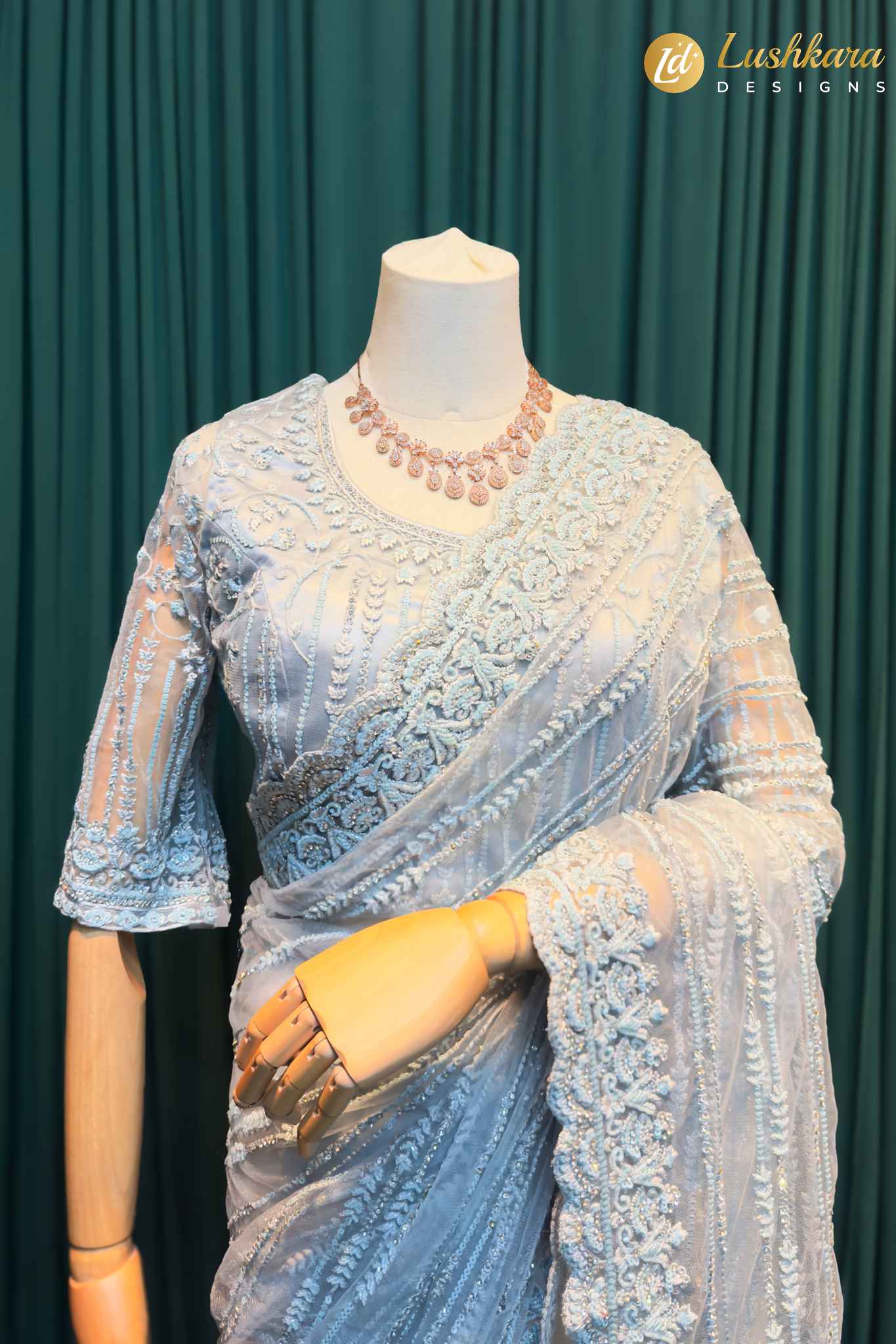 Lushkara Light Blue Embroidered Net Saree