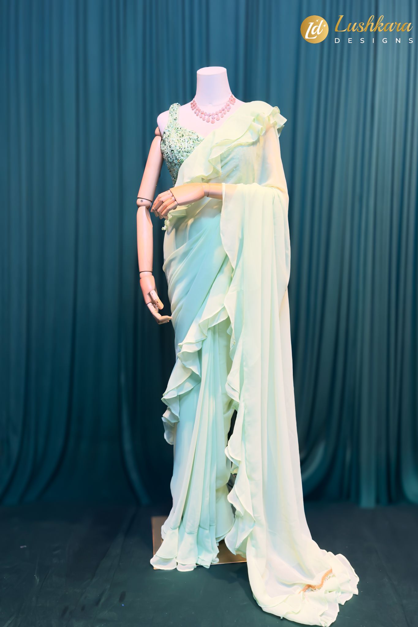 Lushkara Mint Green Ruffle Saree with Embellished Blouse