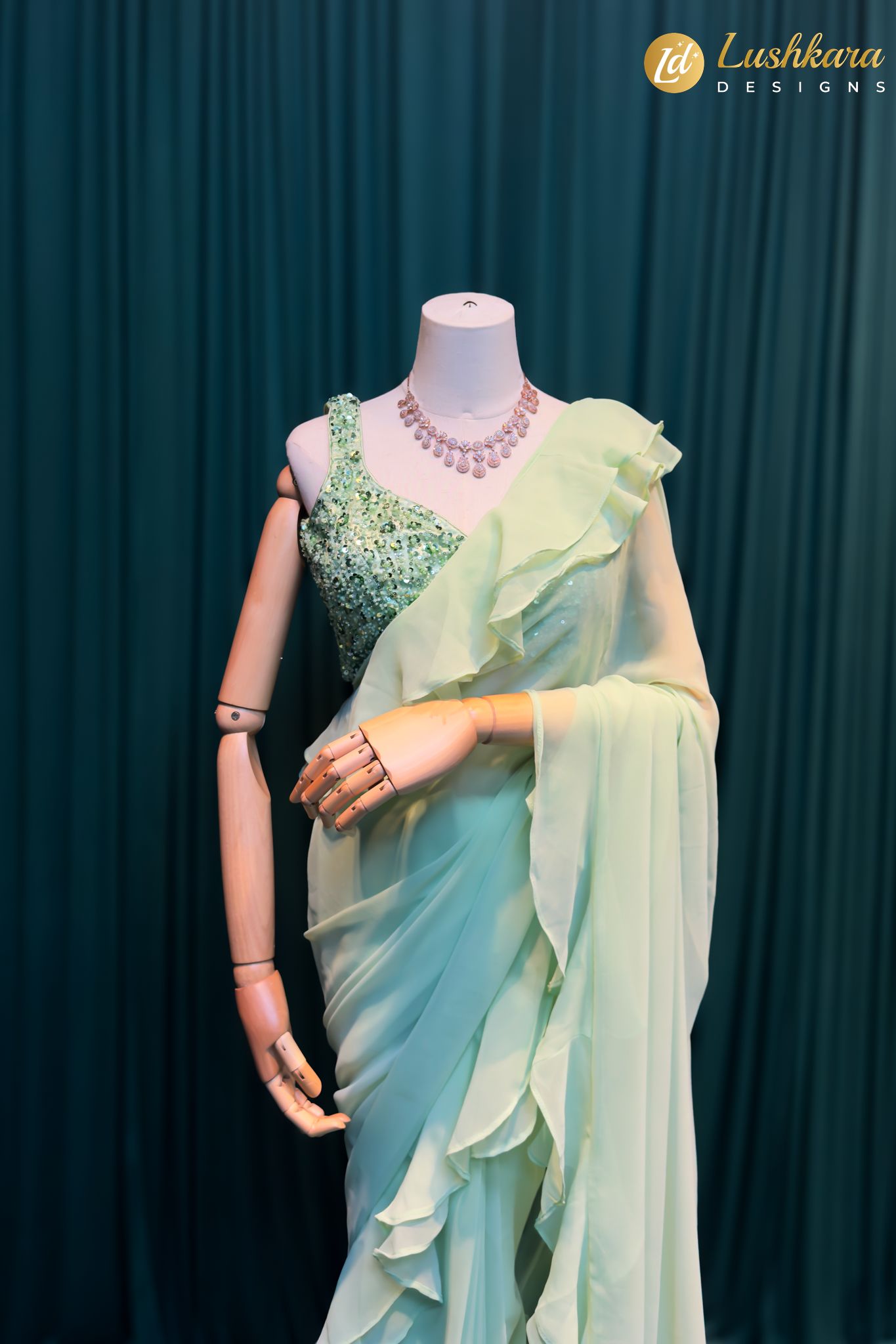 Lushkara Mint Green Ruffle Saree with Embellished Blouse