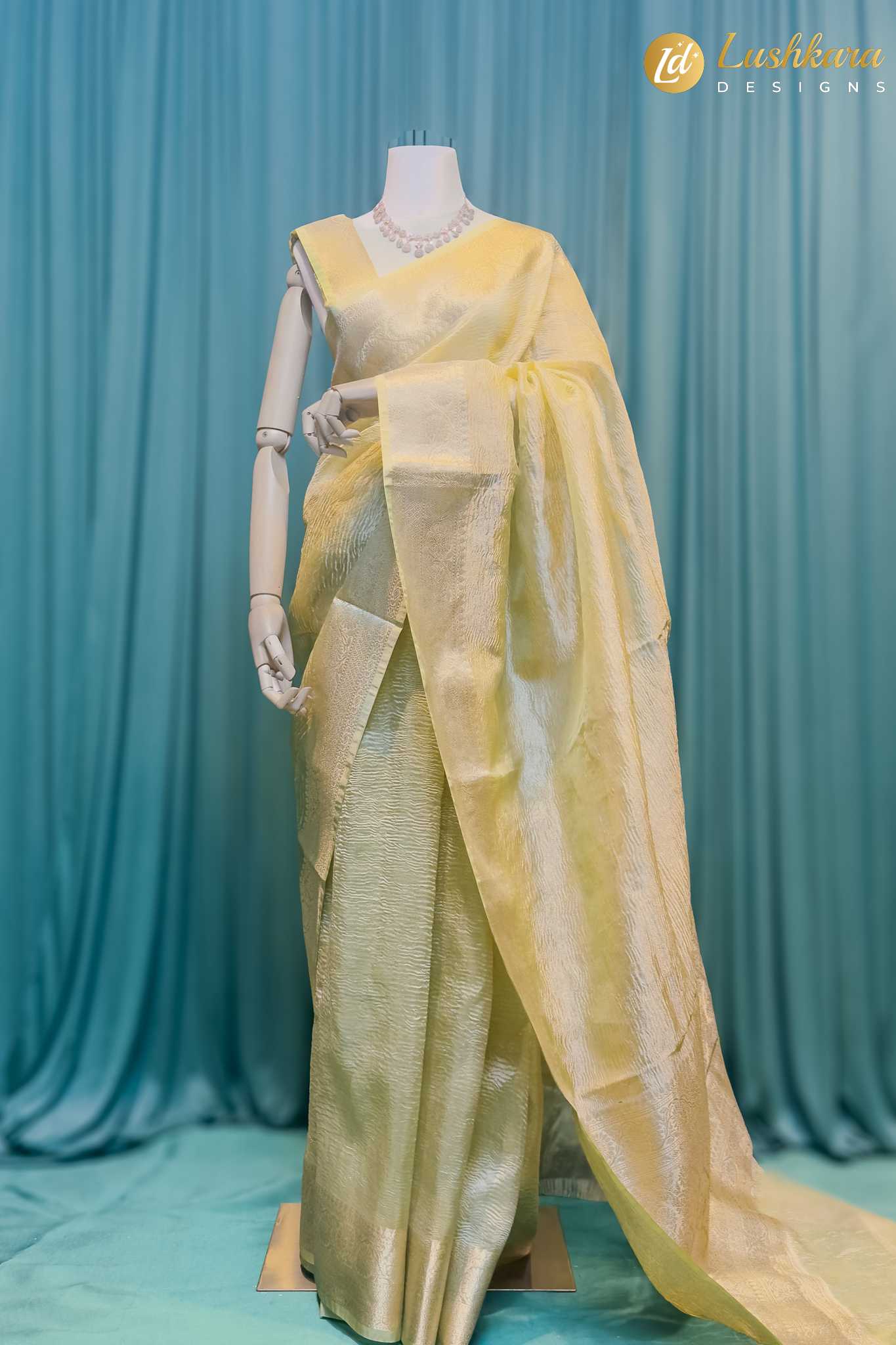 Lushkara Light Olive Banarasi Tissue Saree with Golden Zari Border