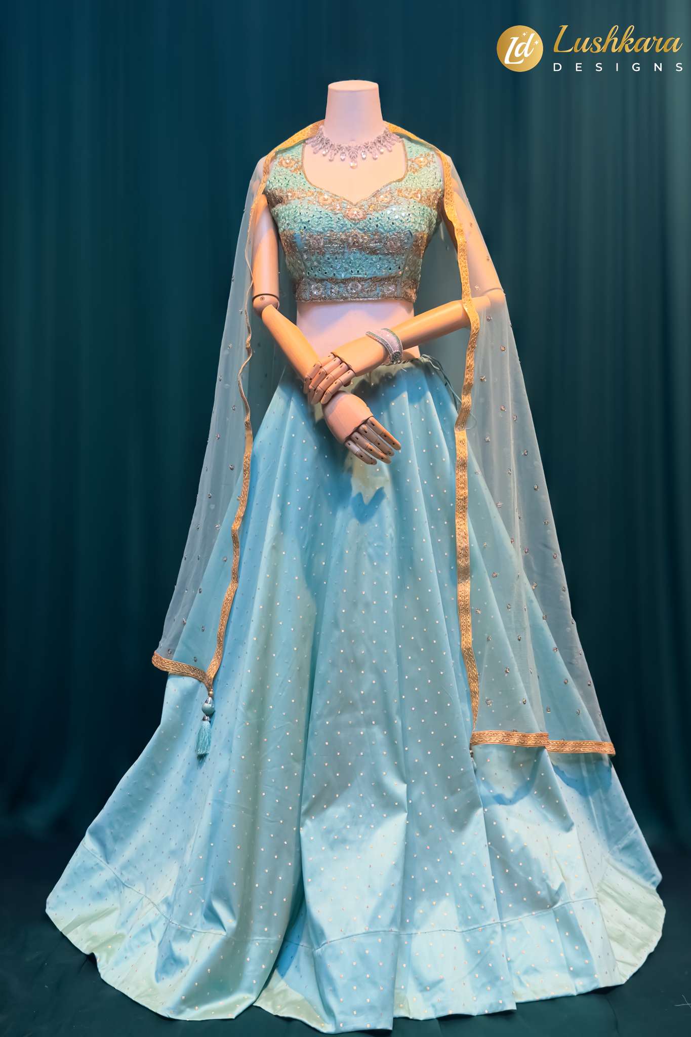 Lushkara Aqua Blue Mirror Work Lehenga with Net Dupatta