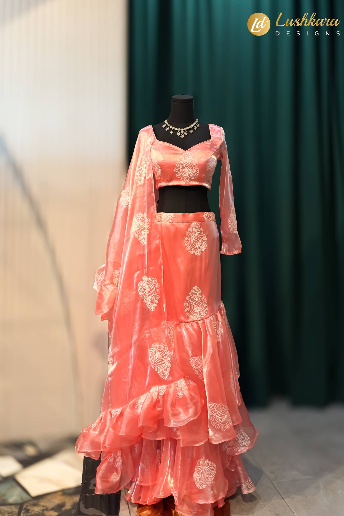 Lushkara Coral Printed Ruffle Lehenga with Thread Work Blouse