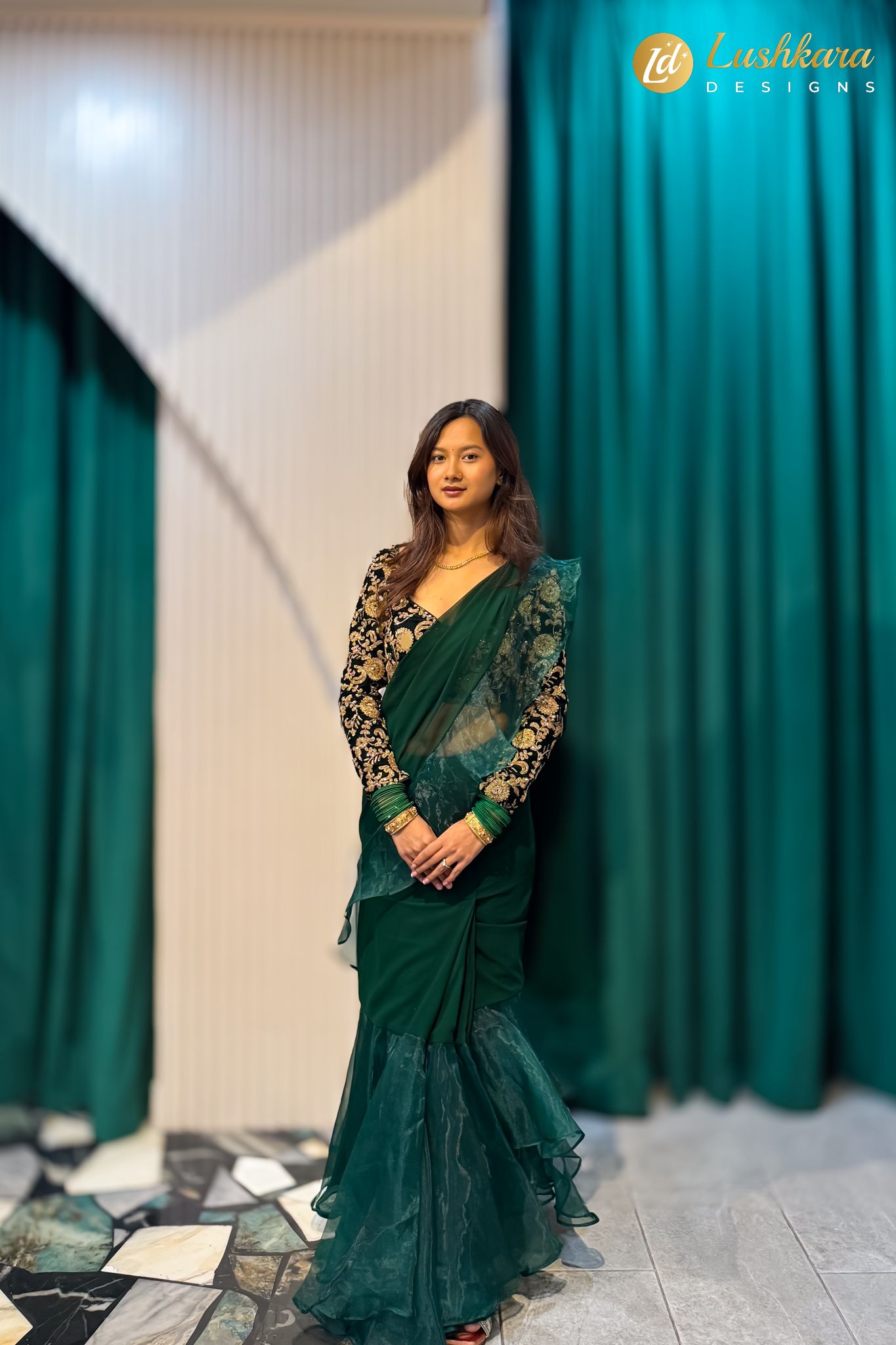 Lushkara Emerald Green Ruffled Saree with Embroidered Blouse