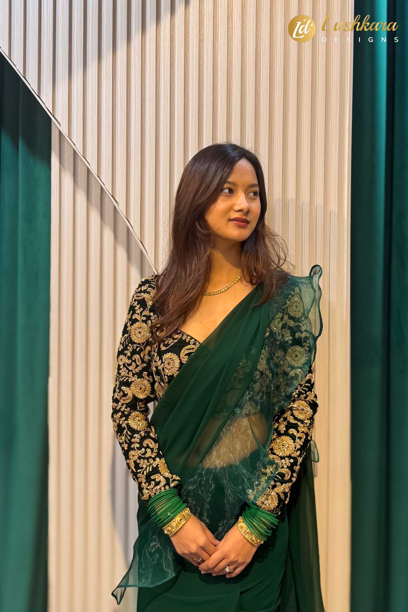 Lushkara Emerald Green Ruffled Saree with Embroidered Blouse