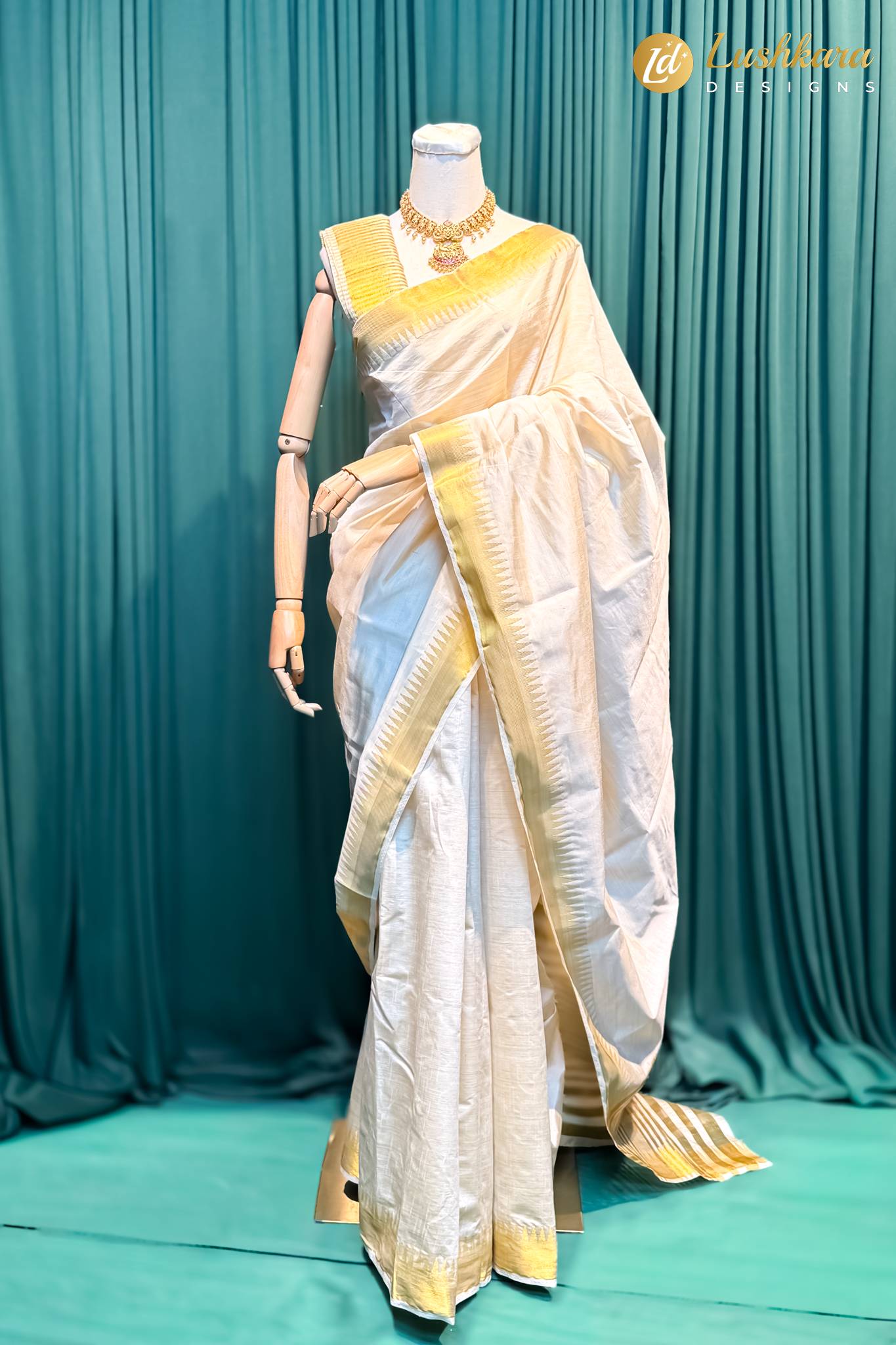 Lushkara White Silk Saree with Gold Border