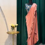 Lushkara Peach Ruffle Saree with Embroidered Blouse